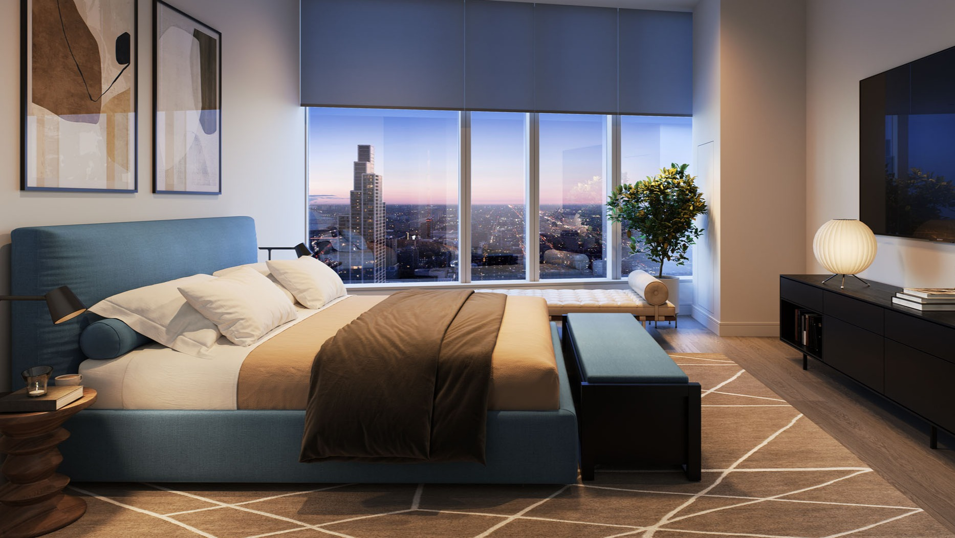 Modern bedroom with blue bed, large TV, and floor-to-ceiling windows overlooking Chicago at 1000M Apartments