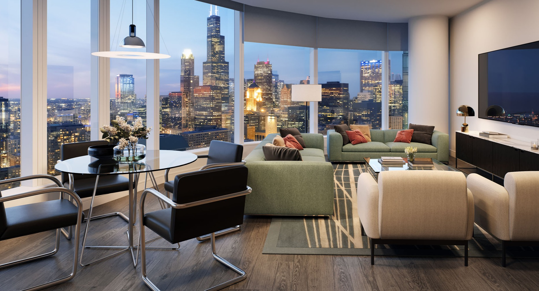 Open living and dining area with large windows, green sofas, and city views at 1000M Apartments in Chicago