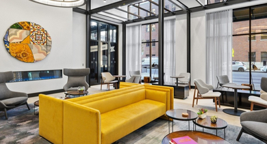 Chic lobby at AMLI 808 apartments in Chicago with contemporary seating and a welcoming design, offering a stylish first impression for residents
