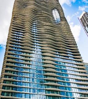 Unique architectural design of Aqua at Lakeshore East, a landmark apartment building in downtown Chicago
