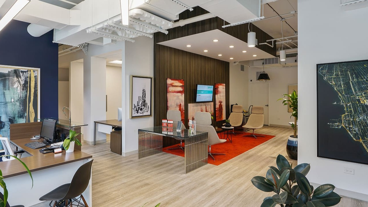 Modern leasing office at Arrive South Loop apartments, featuring contemporary design, comfortable seating, and helpful staff in Chicago