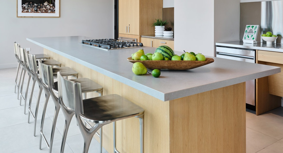 Spacious gourmet kitchen with a large island and bar seating at Arthur on Aberdeen in Chicago, ideal for entertaining