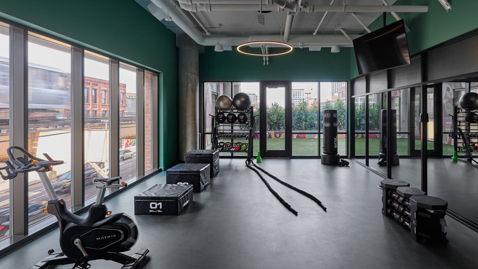Comprehensive gym and workout space at Arthur on Aberdeen in Chicago, offering various equipment for a full body workout