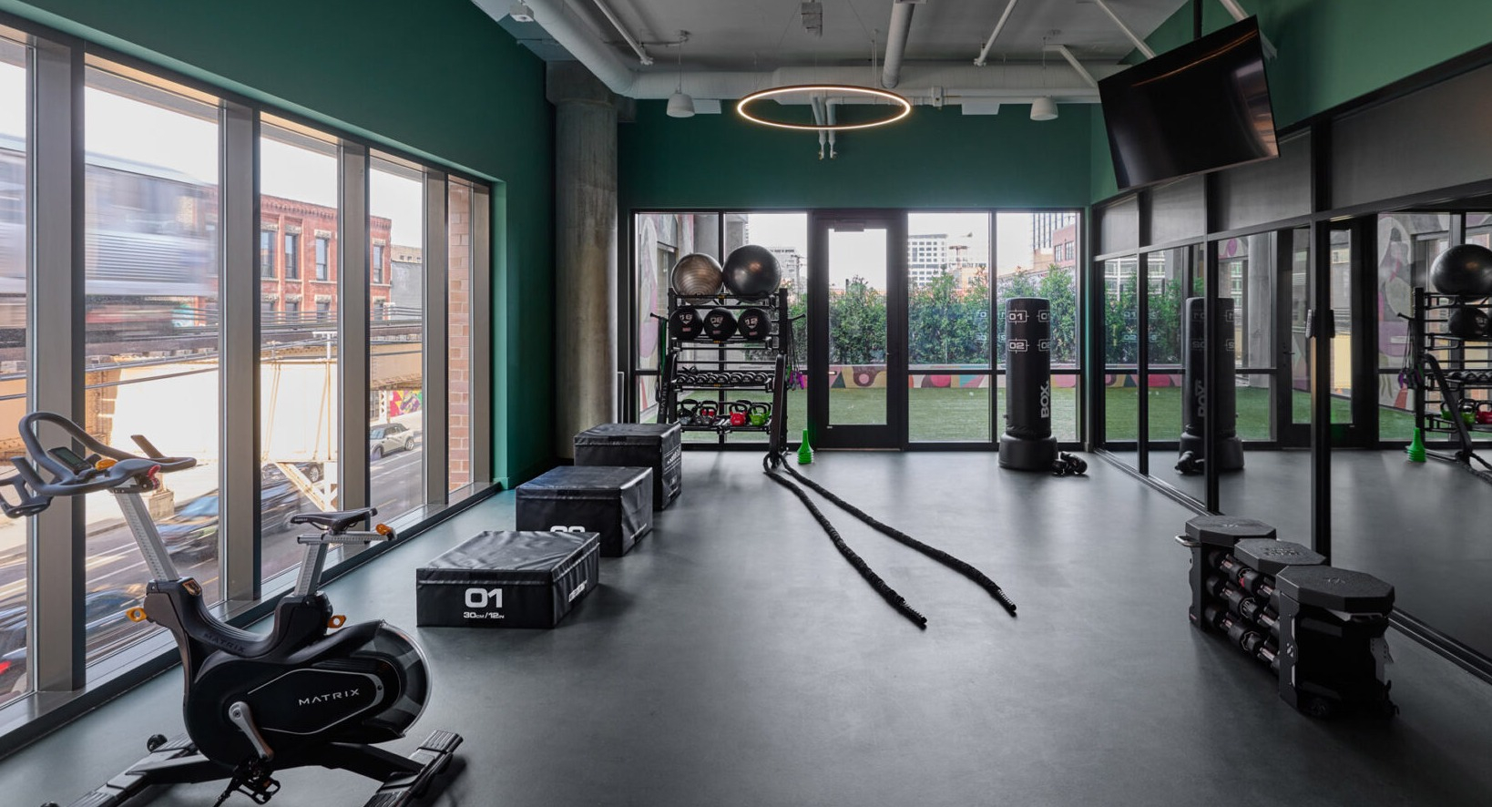 Comprehensive gym and workout space at Arthur on Aberdeen in Chicago, offering various equipment for a full body workout