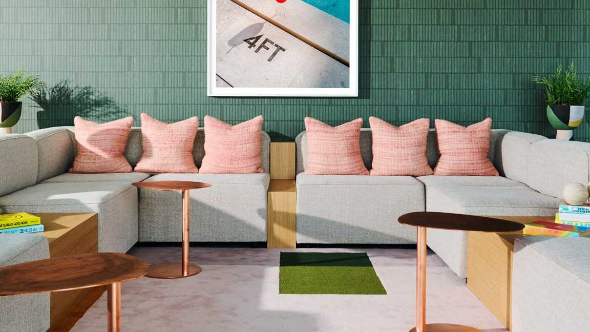 Stylish lounge area at Arthur on Aberdeen in Chicago with modern seating, contemporary decor, and a playful art piece