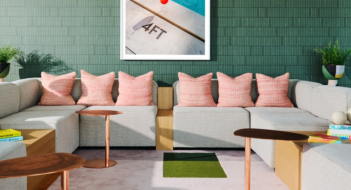 Stylish lounge area at Arthur on Aberdeen in Chicago with modern seating, contemporary decor, and a playful art piece