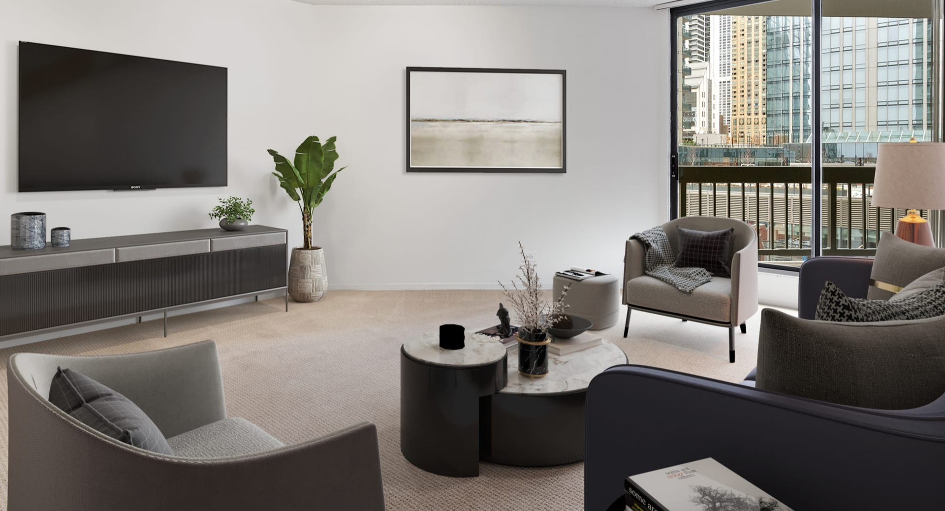 Elegant living area at Asbury Plaza in Chicago, offering comfortable seating, stylish decor, and city views