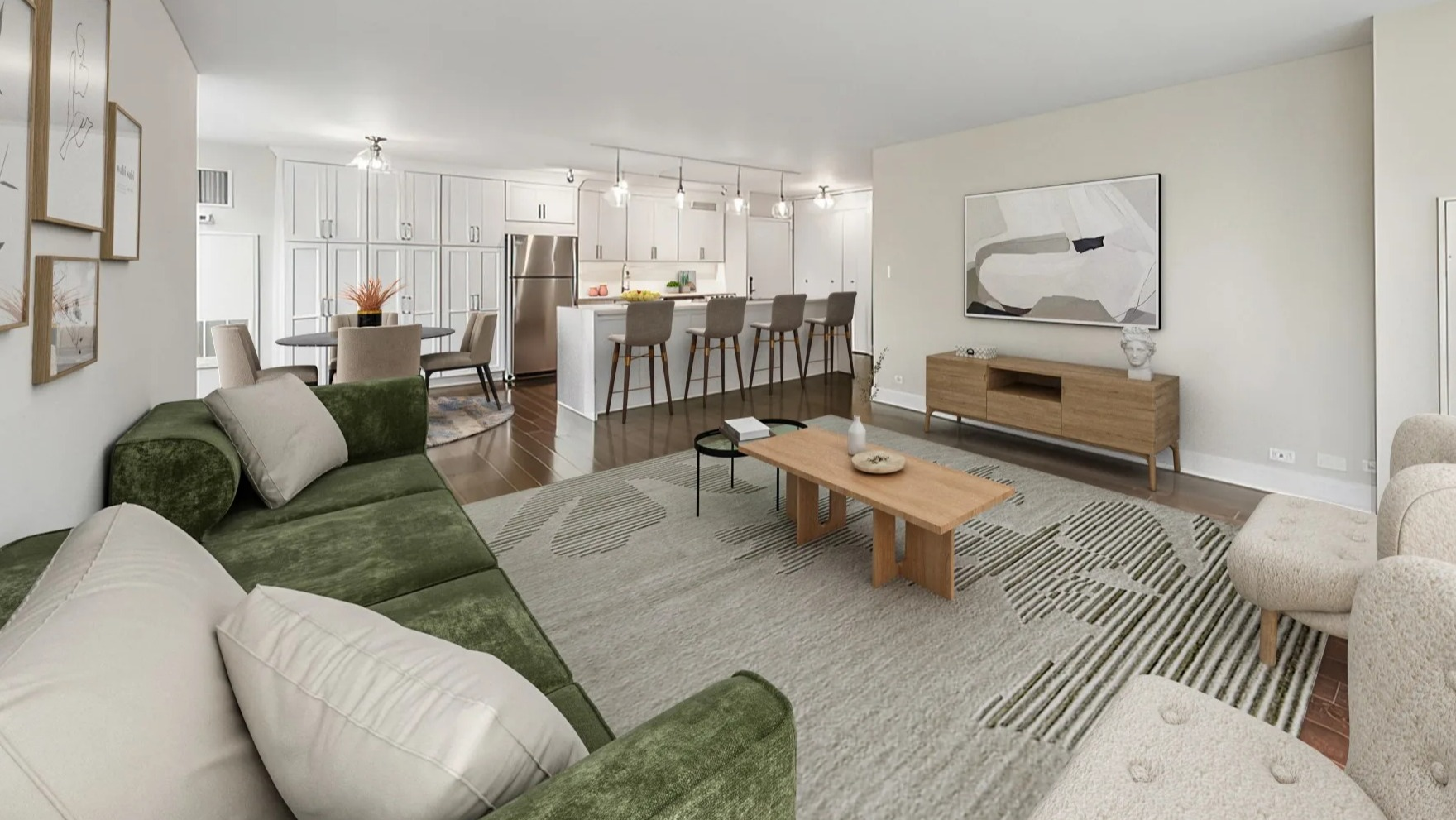 Spacious living and dining area with a green sofa, stylish decor, and an open kitchen at Astor House Apartments in Chicago