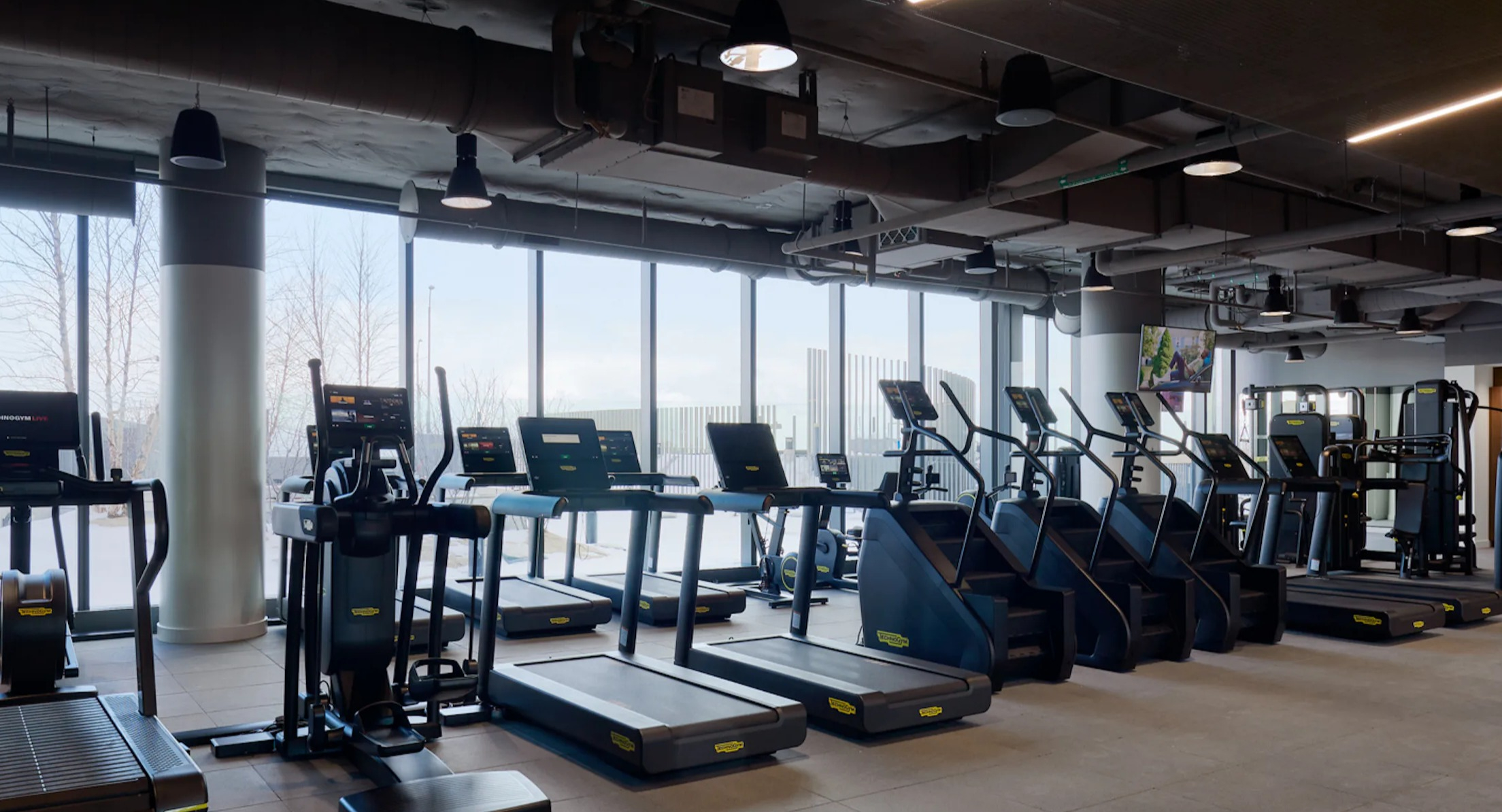 State-of-the-art fitness center with a variety of cardio and weight training equipment at Cascade Lakeshore East in Chicago