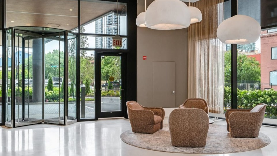Grand and elegant apartment lobby featuring contemporary seating arrangements and stylish lighting at Cassidy on Canal apartments in Chicago
