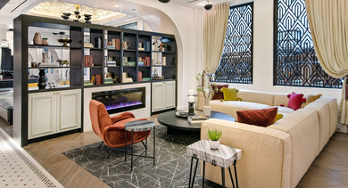 Elegant resident lounge with comfortable seating, a fireplace, and stylish decor at Century Tower Apartments Chicago