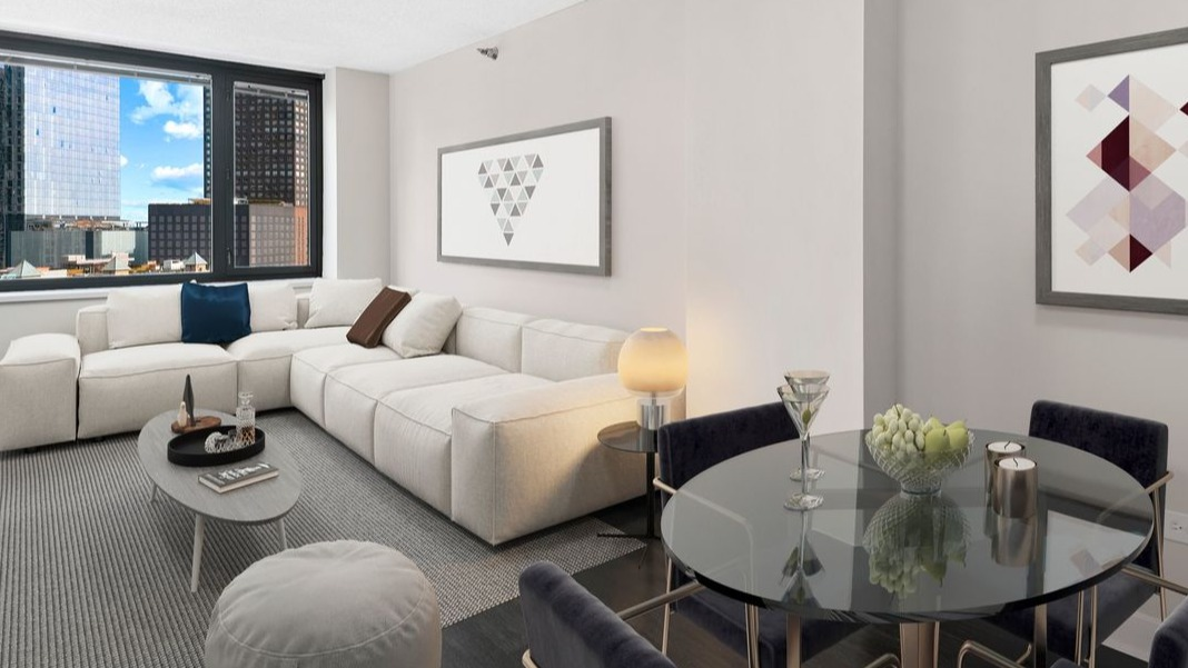 Open-concept living room and dining area at Cityfront Place, perfect for entertaining with stylish furnishings