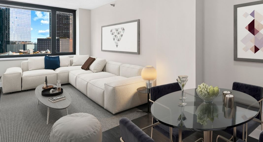 Open-concept living room and dining area at Cityfront Place, perfect for entertaining with stylish furnishings