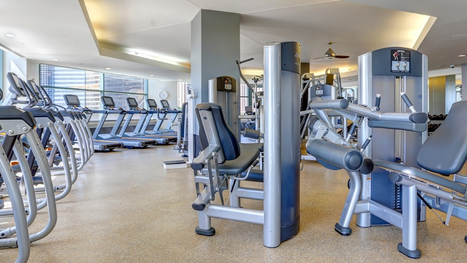 State-of-the-art fitness center at Cityfront Place with various cardio and weight training equipment