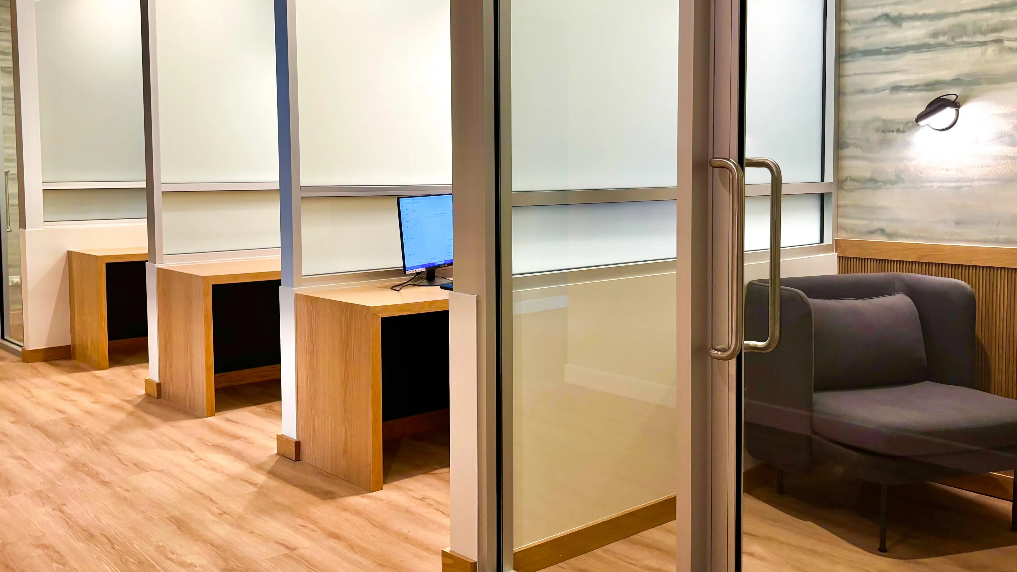 Dedicated coworking spaces and private booths at Coast at Lakeshore East, perfect for remote work or studying