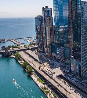 Lakefront view from Coast at Lakeshore East apartments in Chicago. Modern buildings and scenic waterfront