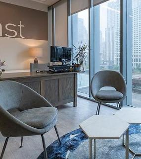 Leasing office at Coast at Lakeshore East apartments in Chicago. Modern and professional space