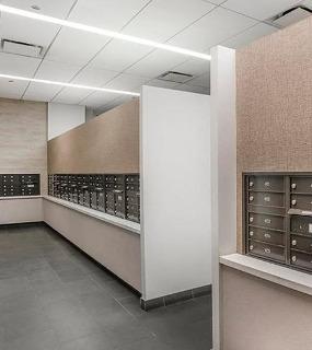 Mailboxes in the resident mailroom at Coast at Lakeshore East apartments in Chicago