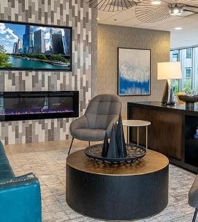 Comfortable seating and stylish decor in the resident lounge at Coast at Lakeshore East apartments in Chicago
