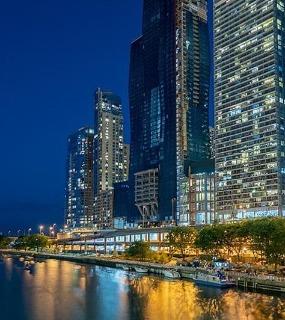 Riverwalk view from Coast at Lakeshore East apartments in Chicago. Features modern buildings and scenic waterfront