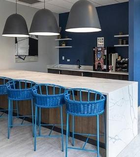 Vending area with seating at Coast at Lakeshore East apartments in Chicago