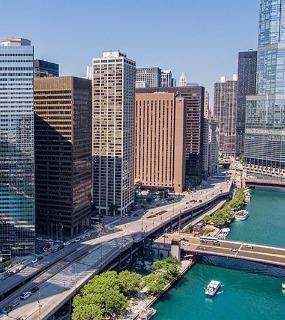 Downtown Chicago skyline with a view of the river from Coast at Lakeshore East apartments