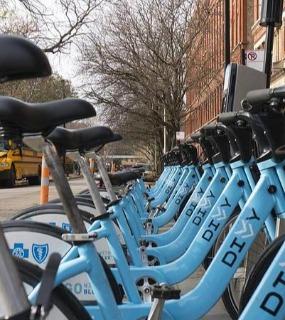 Secure bike storage area with racks and ample space for residents at Cobbler Square Lofts in Chicago