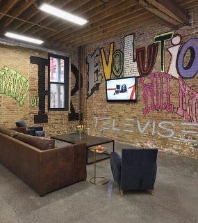 Comfortable lounge area with modern seating and stylish decor at Cobbler Square Lofts in Chicago