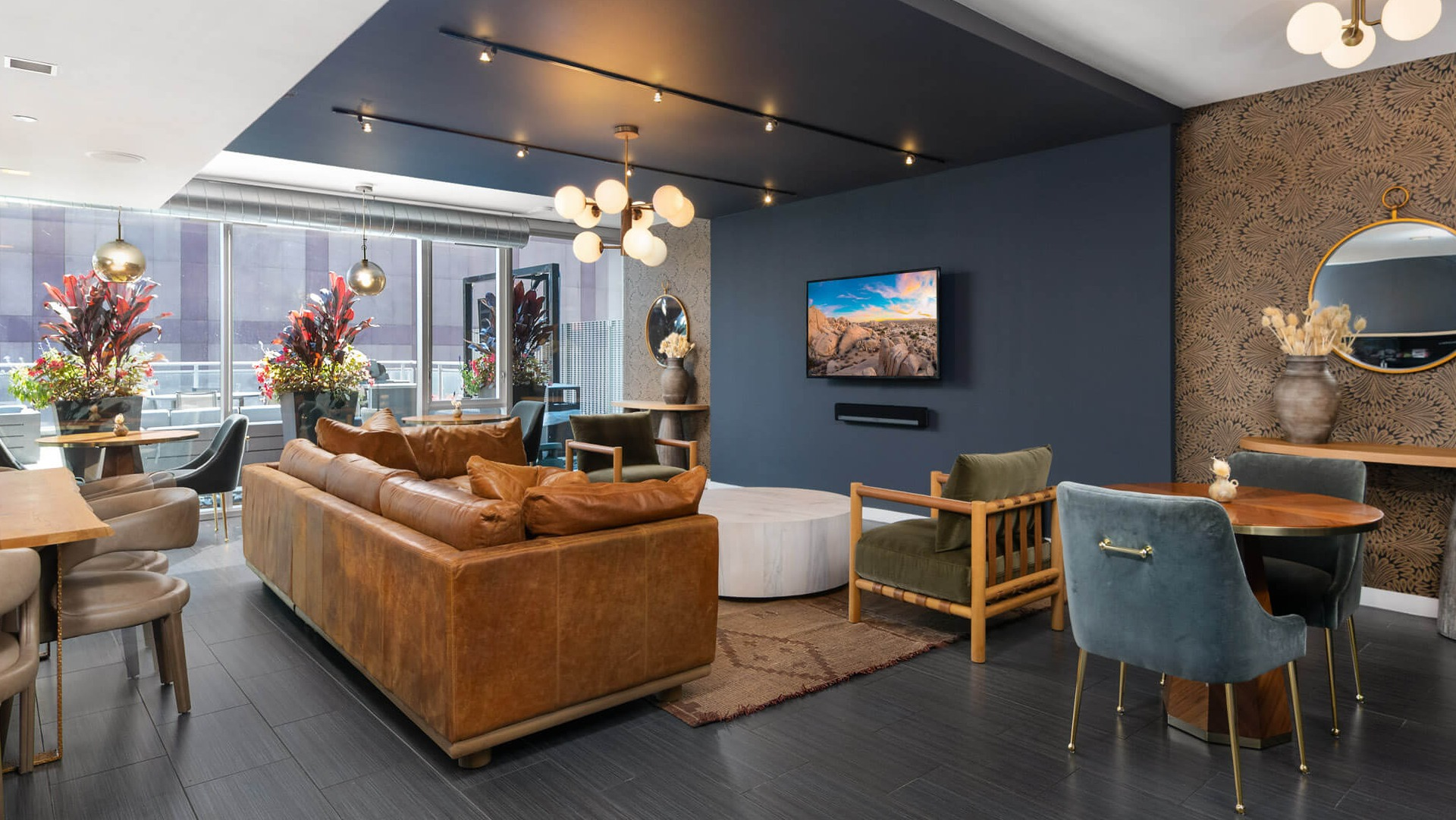 Env Chicago cozy lounge clubroom featuring comfortable seating, stylish decor, and a welcoming ambiance