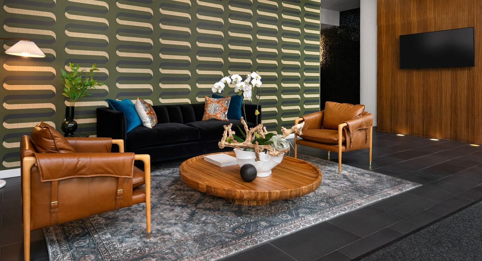 Env Chicago elegant lobby lounge area with stylish seating, modern decor, and sophisticated lighting for residents