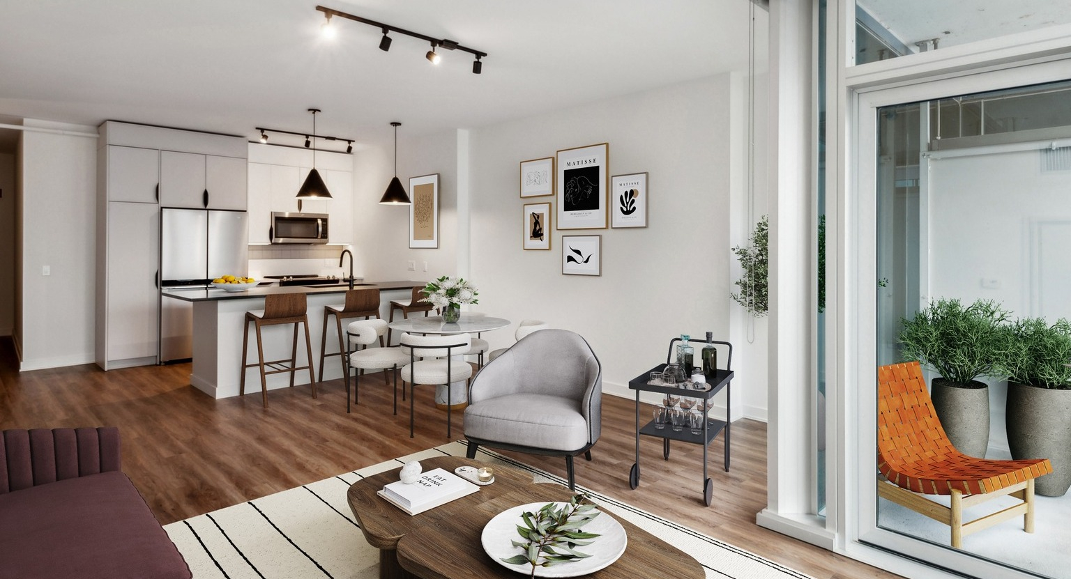 Env Chicago apartment featuring an open-concept living area with modern kitchen, dining space, and balcony access