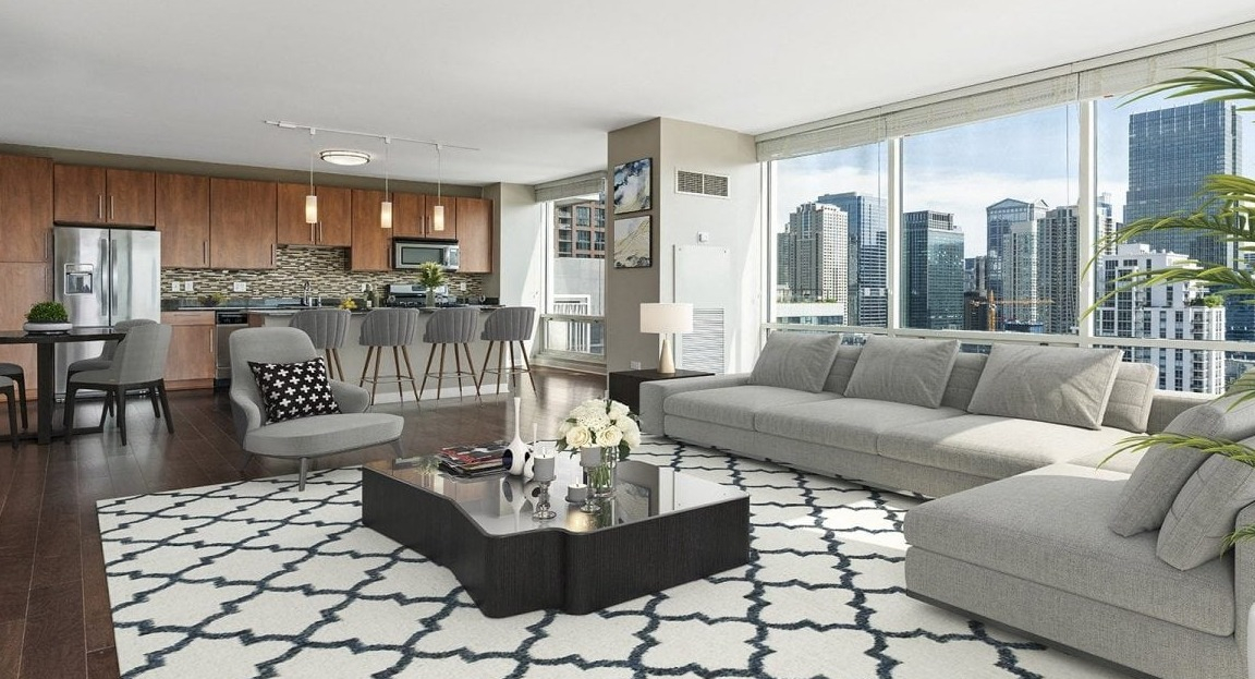 Spacious open-concept apartment at Flair Tower Apartments in Chicago, featuring a modern living room, dining area, and kitchen with city views