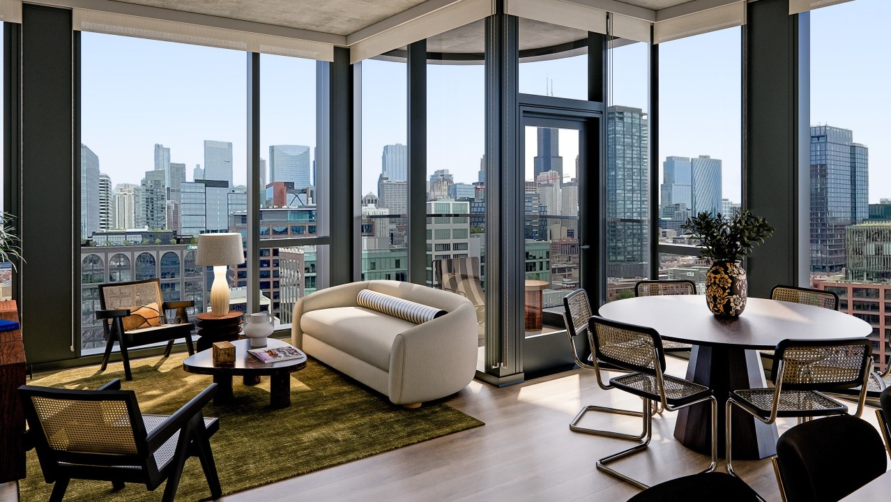 Modern apartment living and dining area at Flora in Chicago, featuring stylish furniture, a round dining table, and stunning city views
