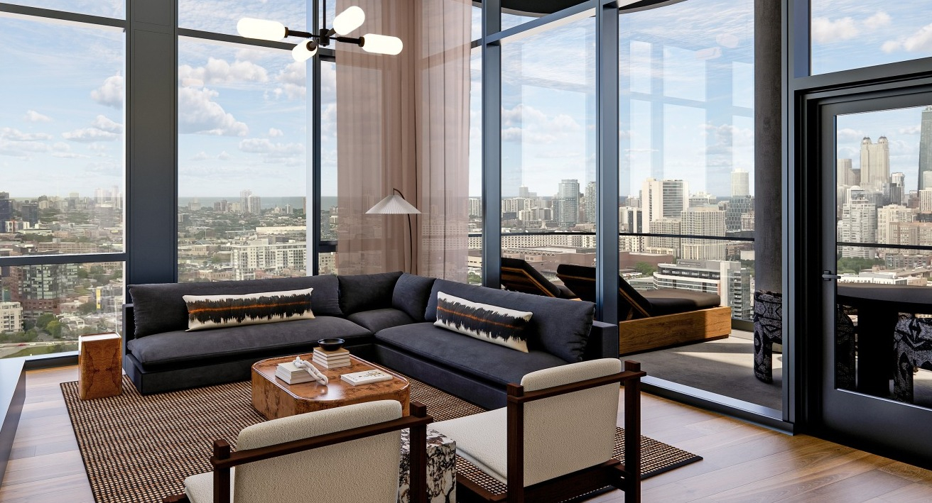 Chic apartment living room at Flora in Chicago, with a large sectional sofa, modern fireplace, and a balcony offering expansive city views