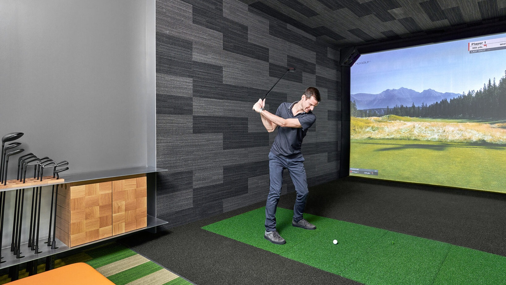 State-of-the-art golf simulator at Fulbrix Apartments in Chicago, offering a realistic virtual golfing experience for residents