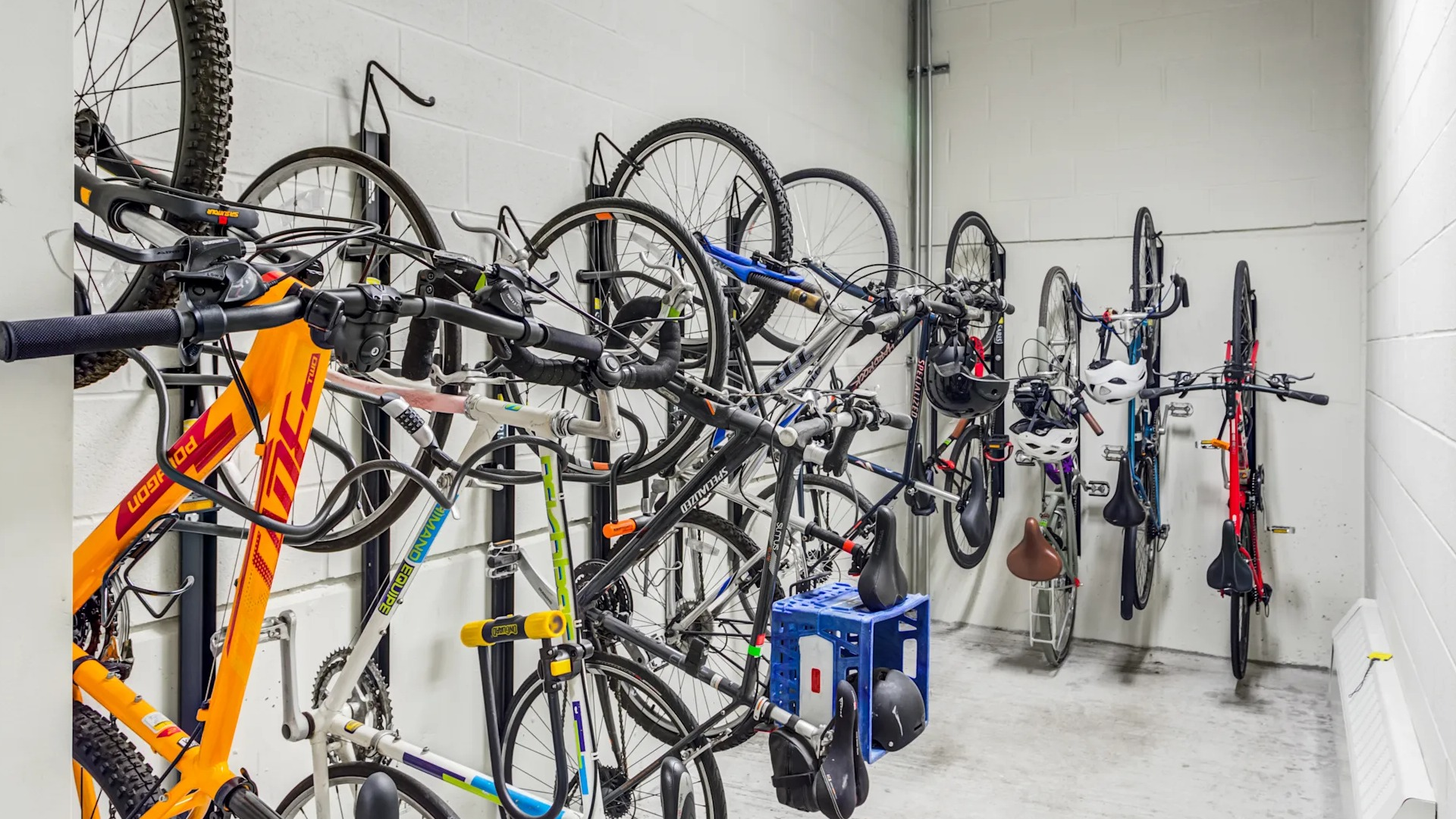 Secure and organized bike storage room with multiple racks, offering convenience for residents at Gateway West Loop in Chicago
