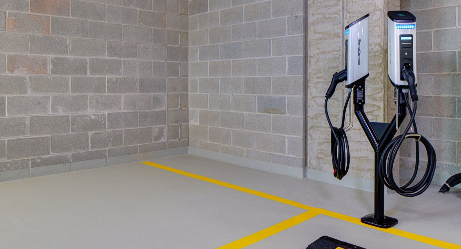Dedicated electric vehicle charging station available for residents, offering convenience at Gild apartments in Chicago