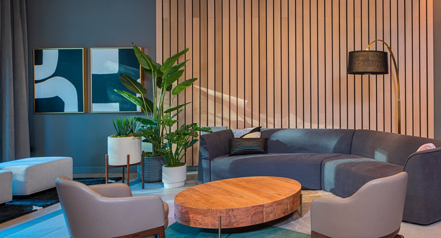 Elegant lounge area with comfortable seating, modern decor, and a warm ambiance at Gild apartments in Chicago