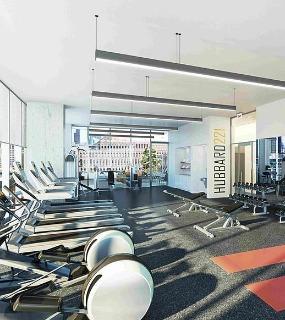 Fully equipped fitness center with modern workout equipment at Hubbard 221 in Chicago