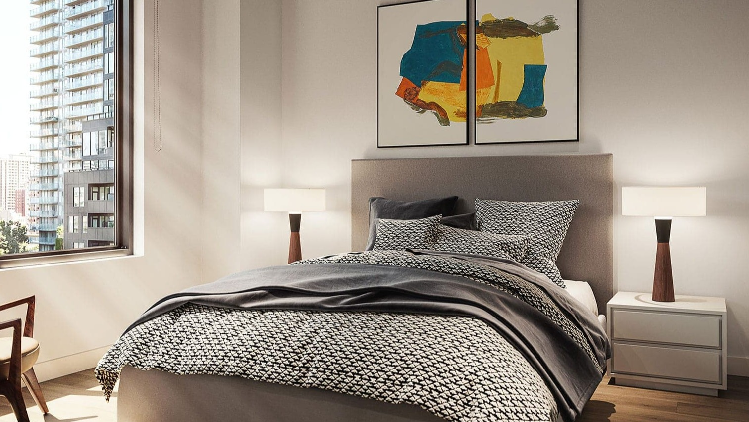 Cozy bedroom featuring a comfortable bed, stylish artwork, and large windows with city views at Hugo Apartments River North, Chicago