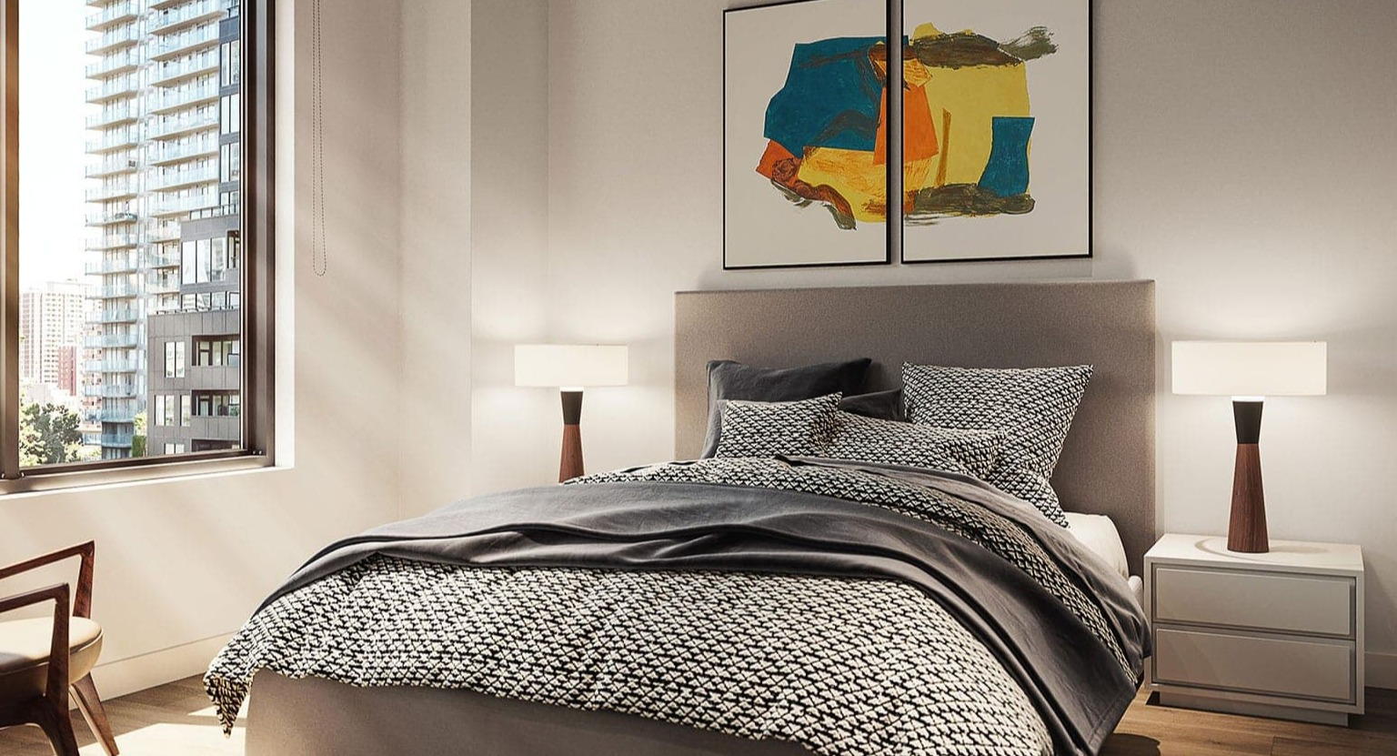 Cozy bedroom featuring a comfortable bed, stylish artwork, and large windows with city views at Hugo Apartments River North, Chicago