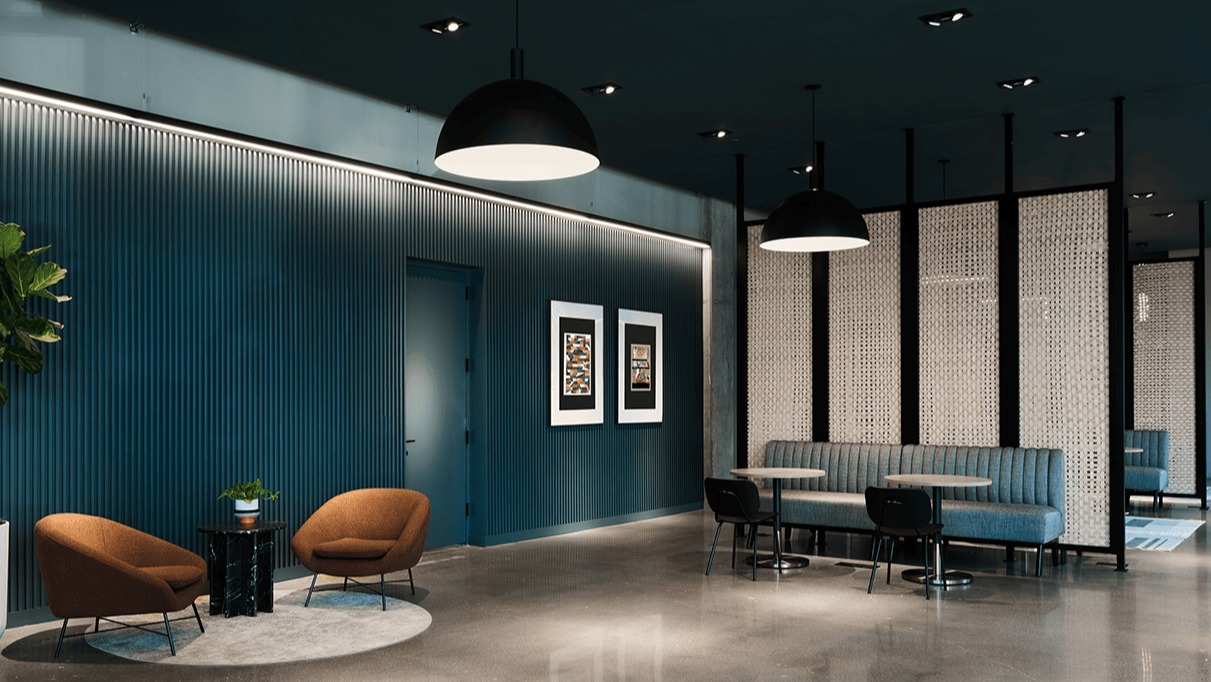 Stylish lobby and lounge area with modern seating, contemporary lighting, and elegant decor at Hugo Apartments River North, Chicago