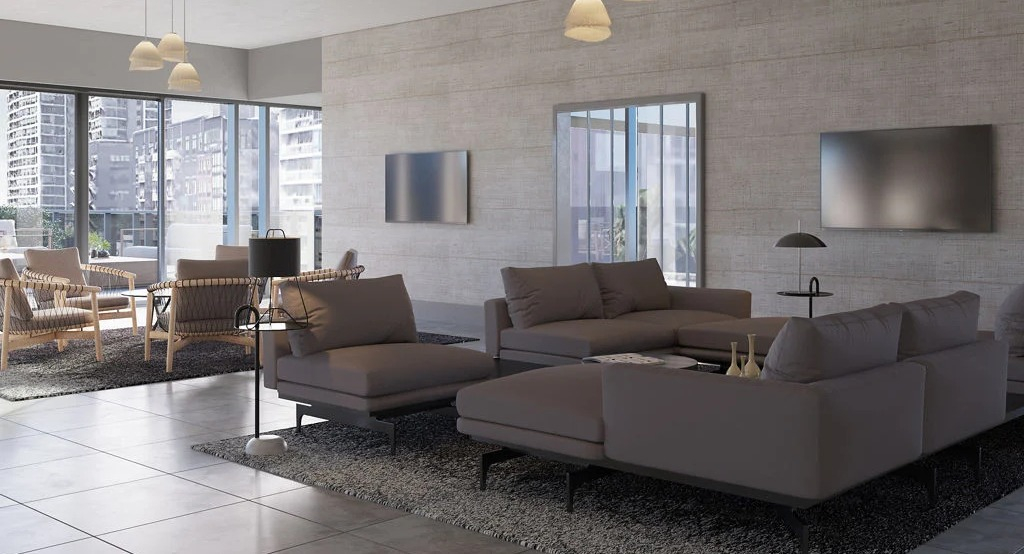 Expansive resident lounge with comfortable sofas, accent chairs, and elegant lighting, ideal for relaxation at Imprint apartments in Chicago