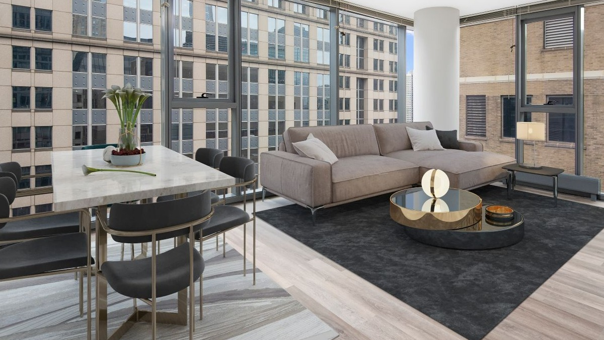 Lake & Wells modern living and dining space with stylish furniture and large windows providing city views