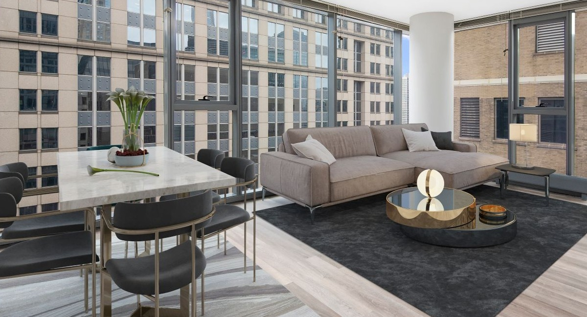 Lake & Wells modern living and dining space with stylish furniture and large windows providing city views