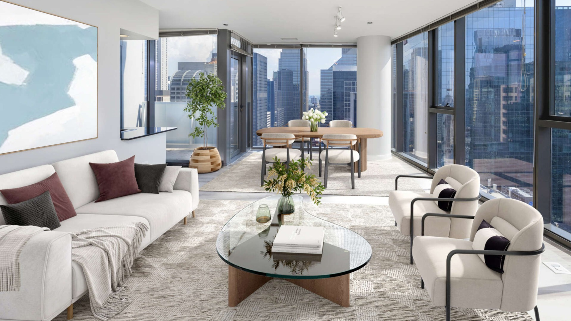 Lake & Wells spacious living and dining room with contemporary furniture and panoramic city views