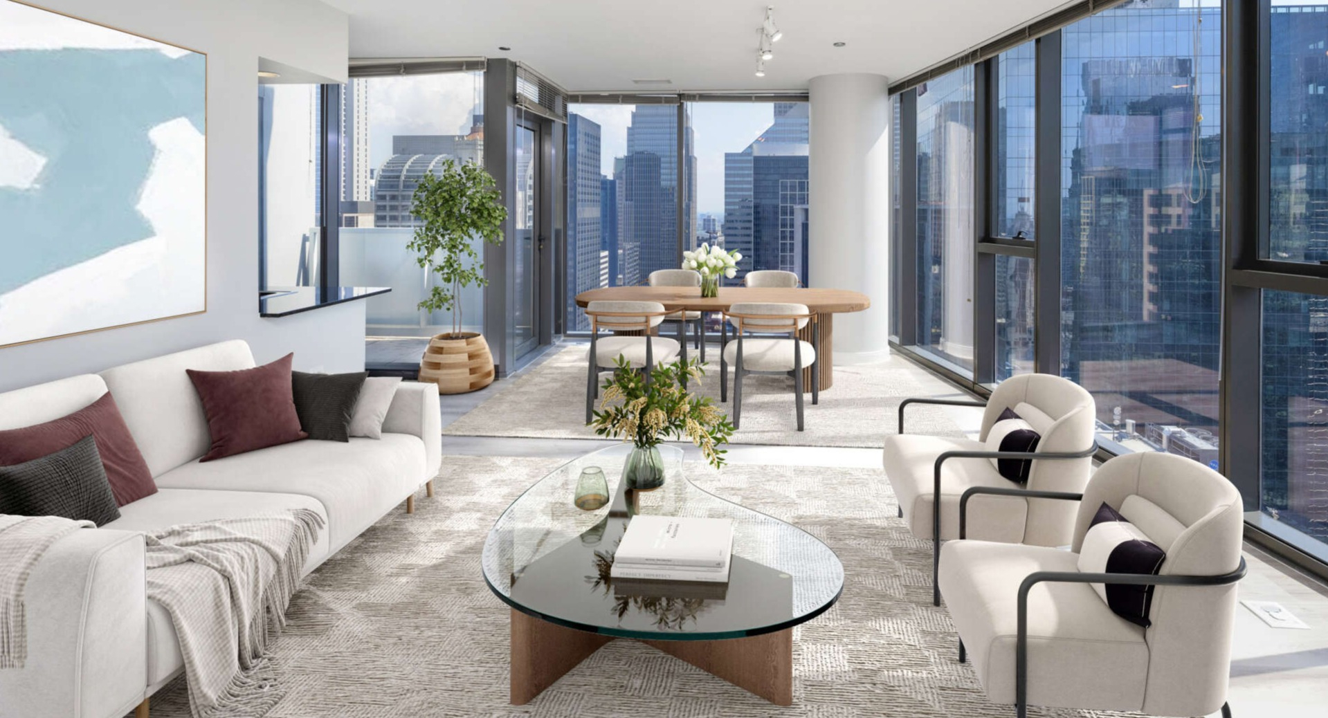 Lake & Wells spacious living and dining room with contemporary furniture and panoramic city views