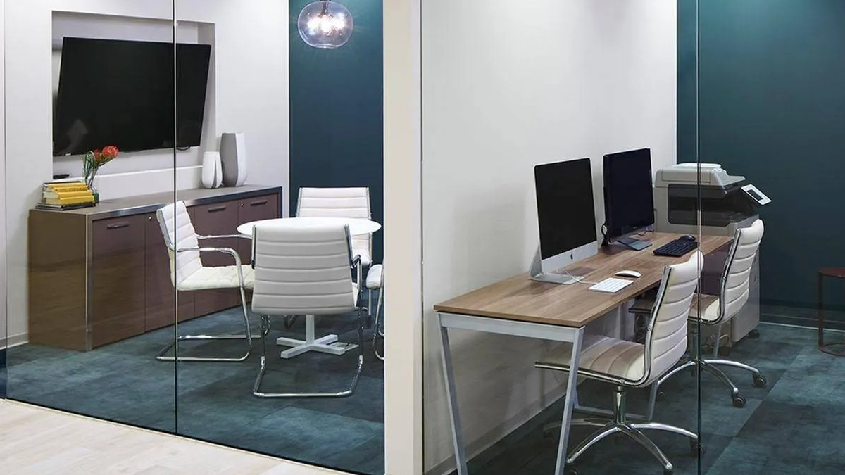 Modern business center featuring private offices, co-working spaces, and contemporary furnishings at Marquee at Block 37 in Chicago