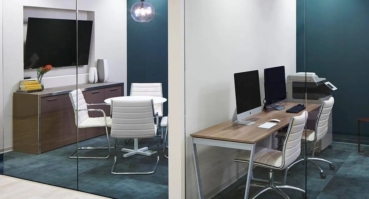 Modern business center featuring private offices, co-working spaces, and contemporary furnishings at Marquee at Block 37 in Chicago