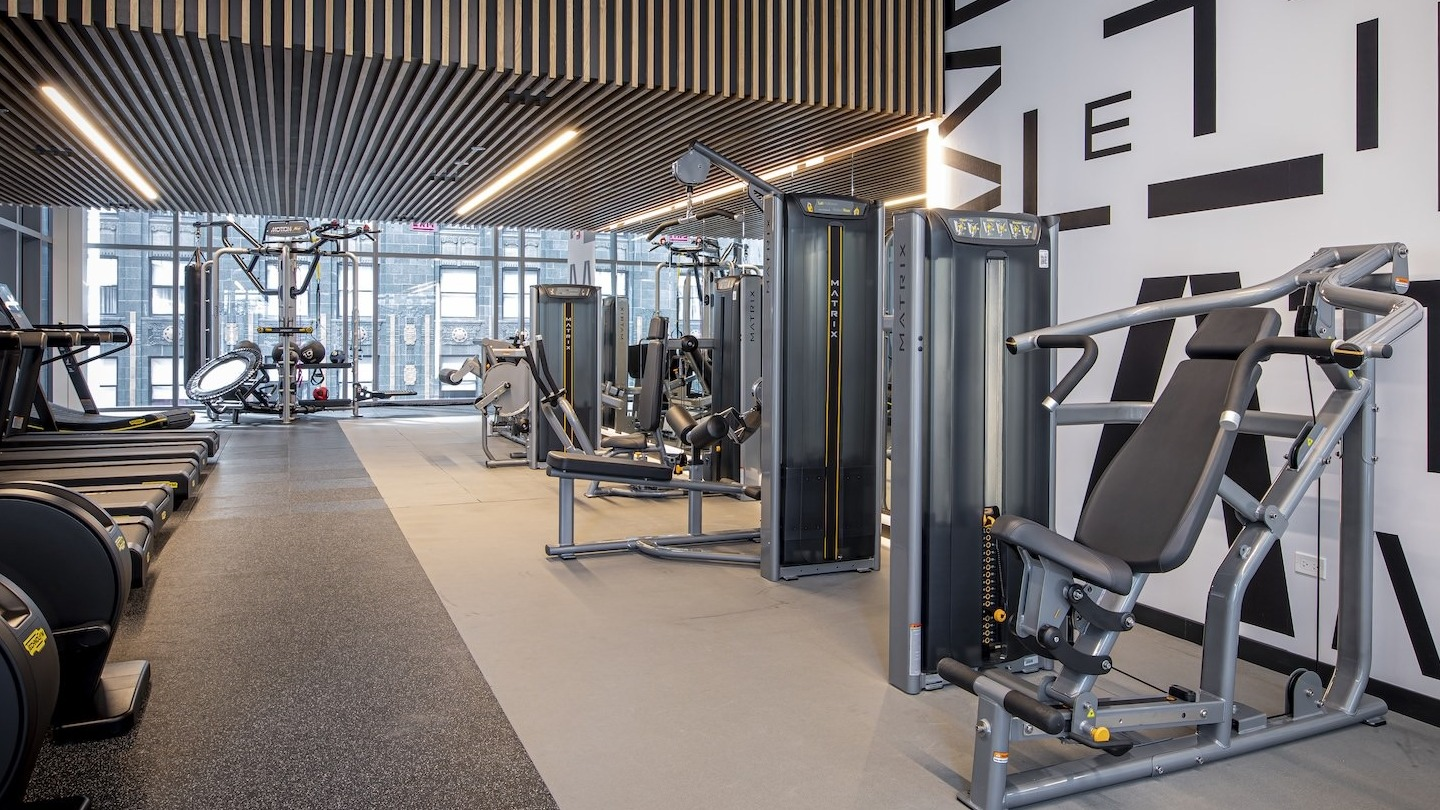 State-of-the-art fitness center with diverse workout equipment at Millie on Michigan apartments in Chicago